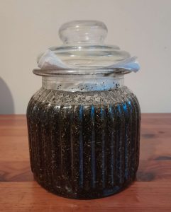Jar of Comfrey herb-infused oil